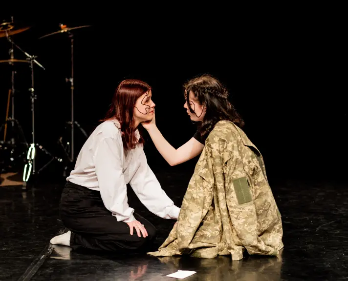 two girls performing a piece